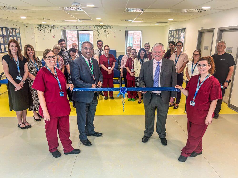 Altrincham Dental Clinic opening photo with staff and commissioners